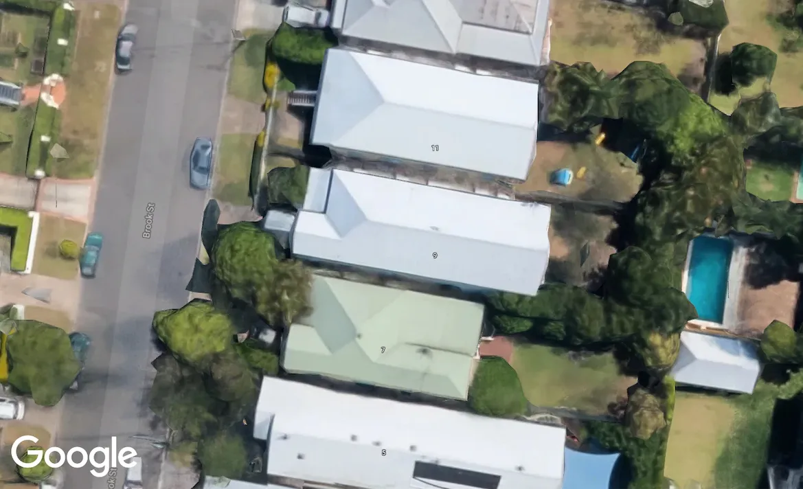 Satellite view of Australian rooftops representing solar lead service area targeting