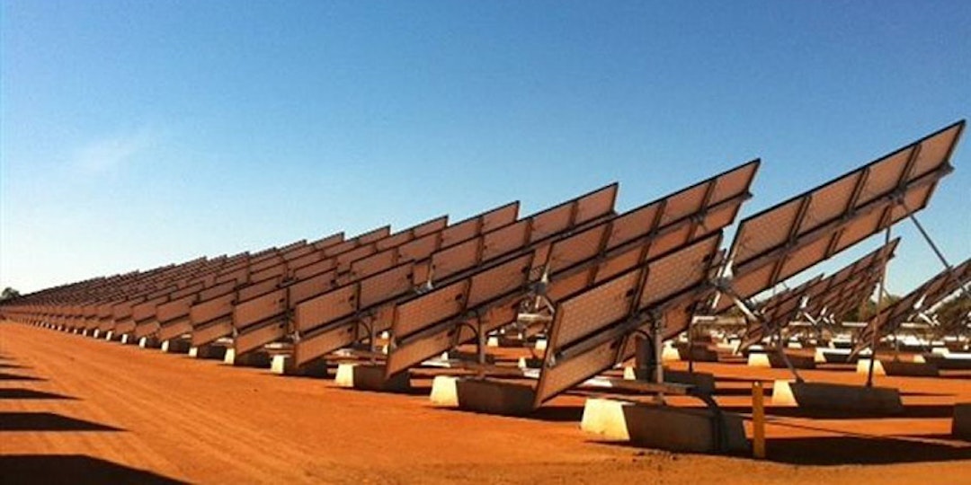 solar farm in Australian outback viewed from behind solar panels