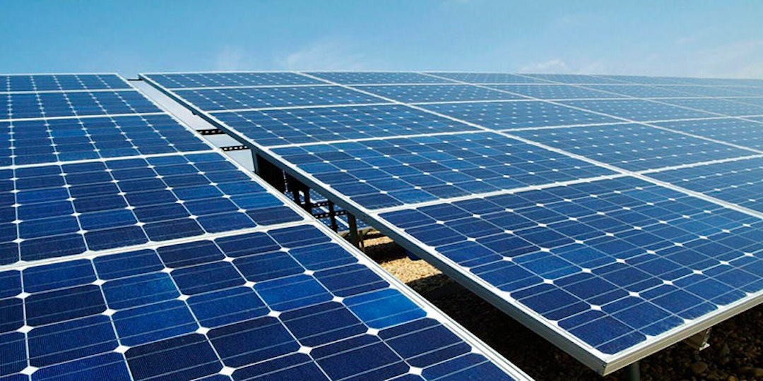 ground mounted solar panels with blue sky background