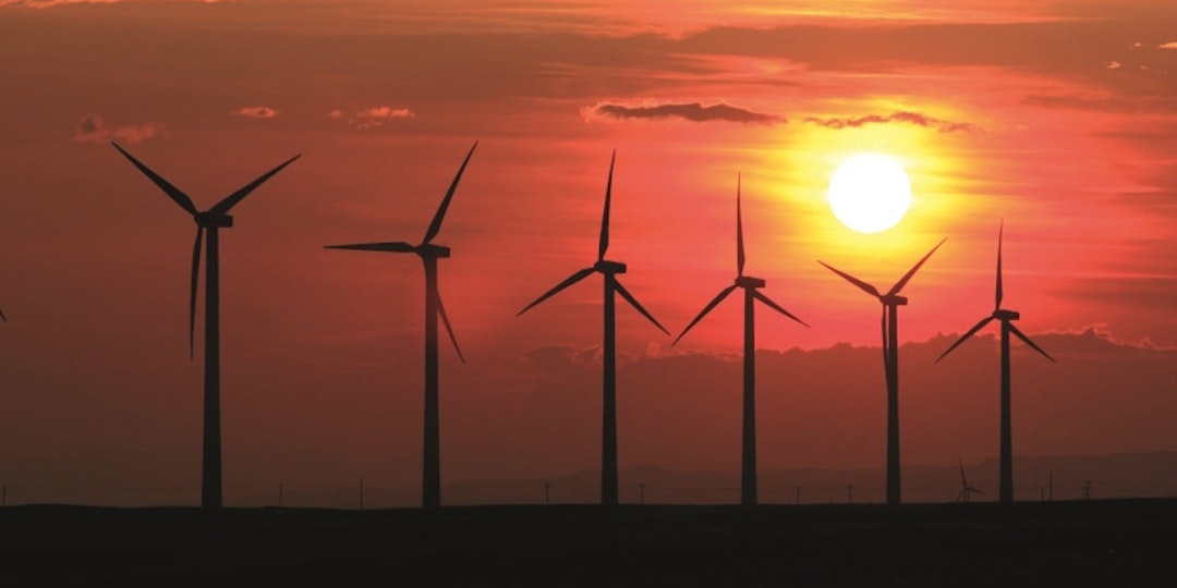 silhouette of 6 wind turbines at sunset